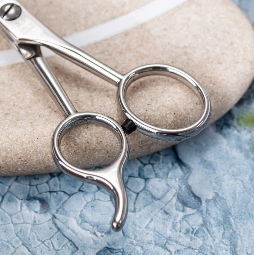 Tijera de peluqueria Ultra 5.5" con filo microdentado 3 Claveles