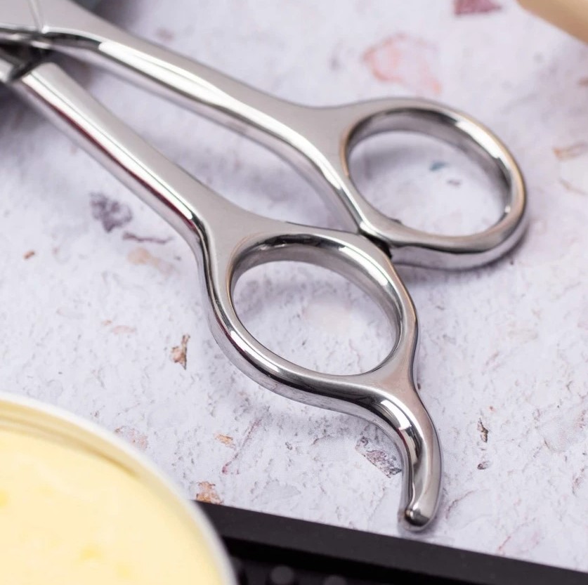 Tijera de peluqueria Mega 8" con filo microdentado 3 Claveles