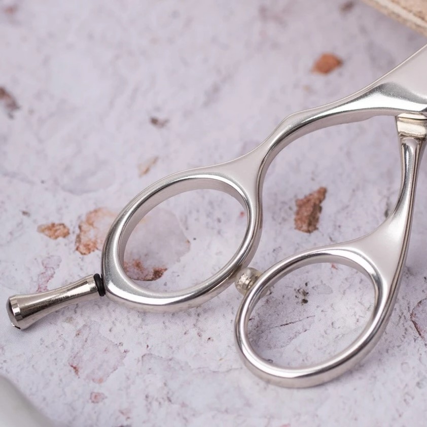 Tijera peluquero Left Dur 5,5" en acero inoxidable 3 Claveles