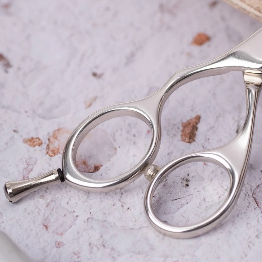 Tijera peluquero Left Dur ES28 5,5" en acero inoxidable 3 Claveles