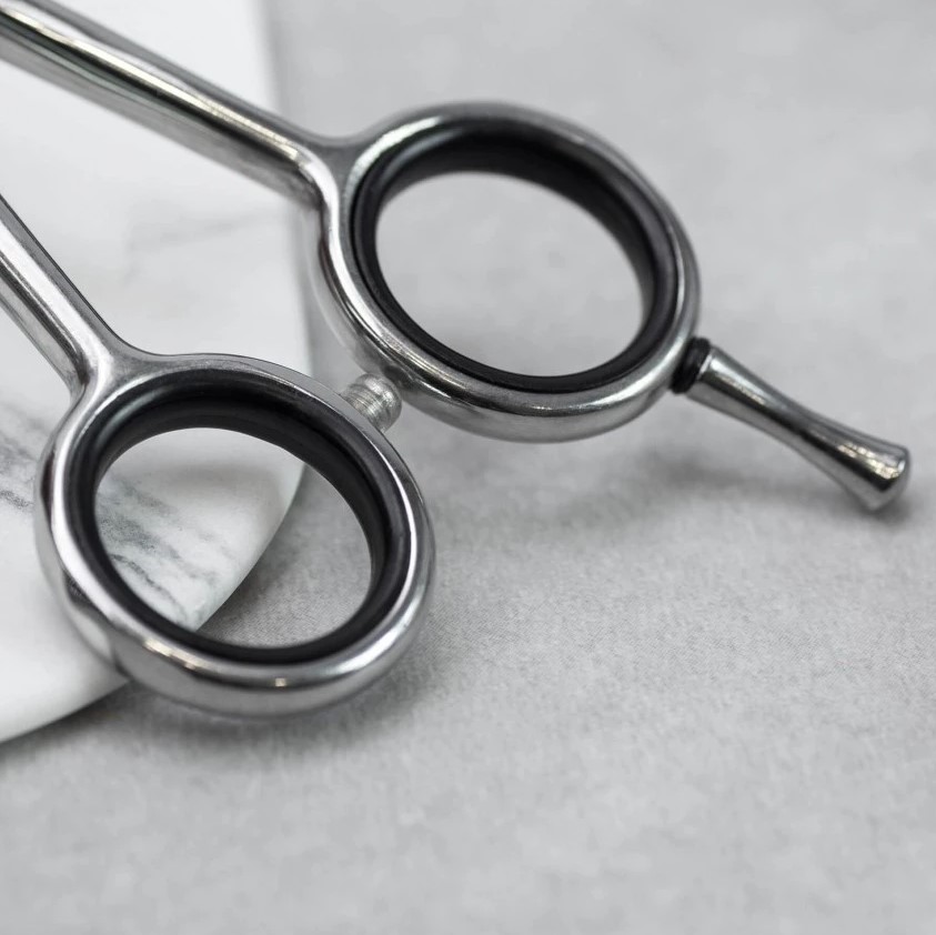 Tijera peluquero Air 6" en acero inoxidable 3 Claveles