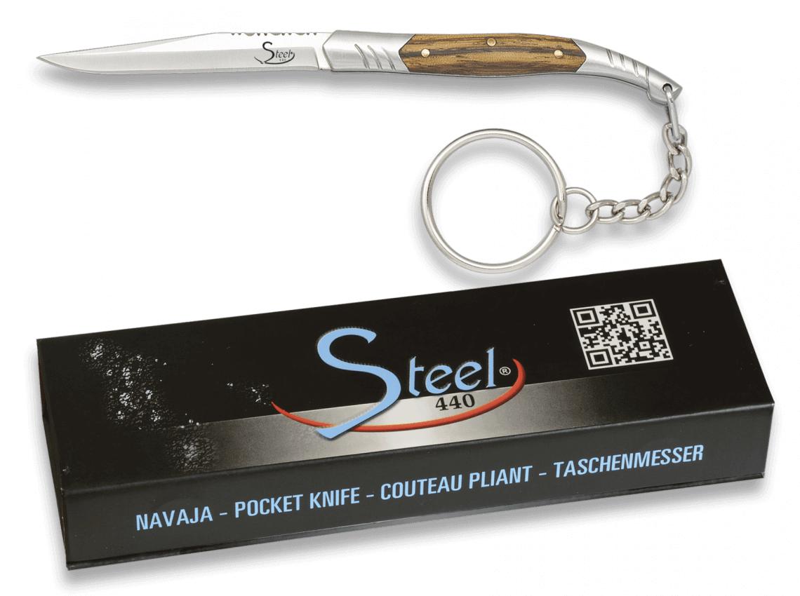 Canivete STEEL 440 com cabo de madeira zebra, virola de aço e lâm...