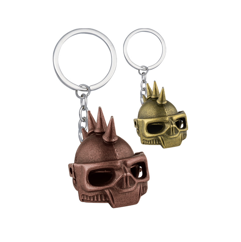 Blister 12 llaveros calavera pinchos fabricado de zamak