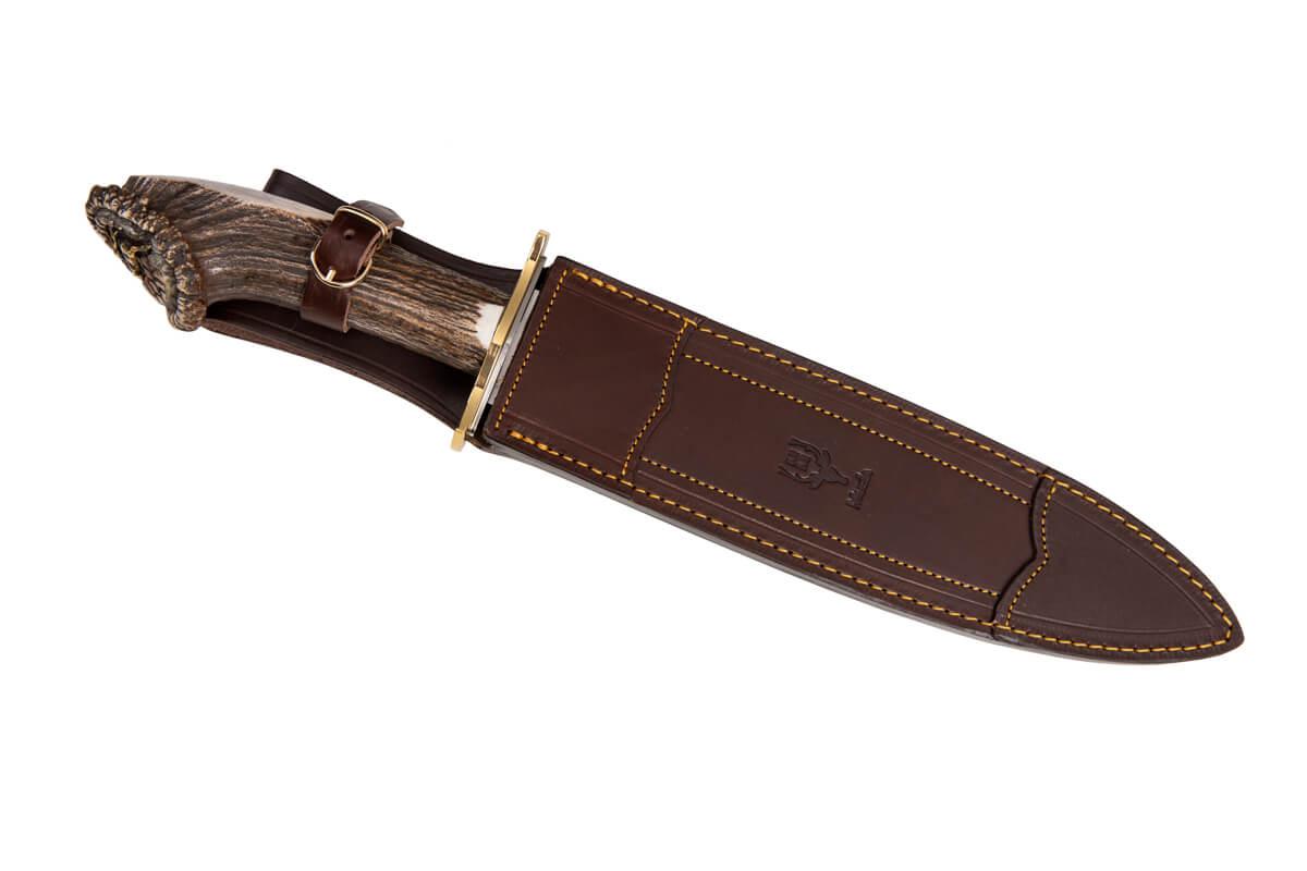 Cuchillo de caza Muela Podenquero GV con mango de asta de ciervo con tallado de escena de ciervo