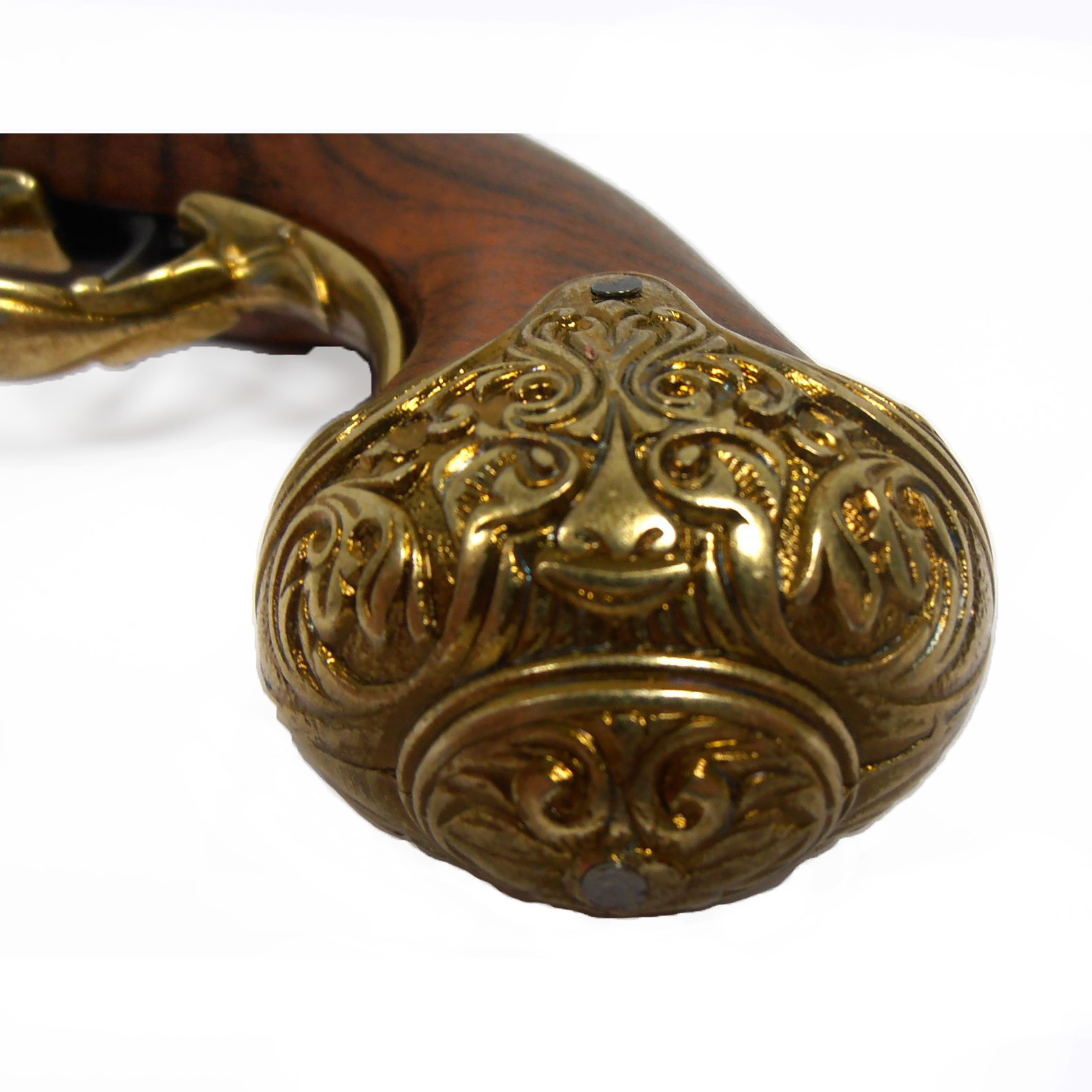 Pistola de chispa zurda de madera y metal acabado latón, India S. XVIII